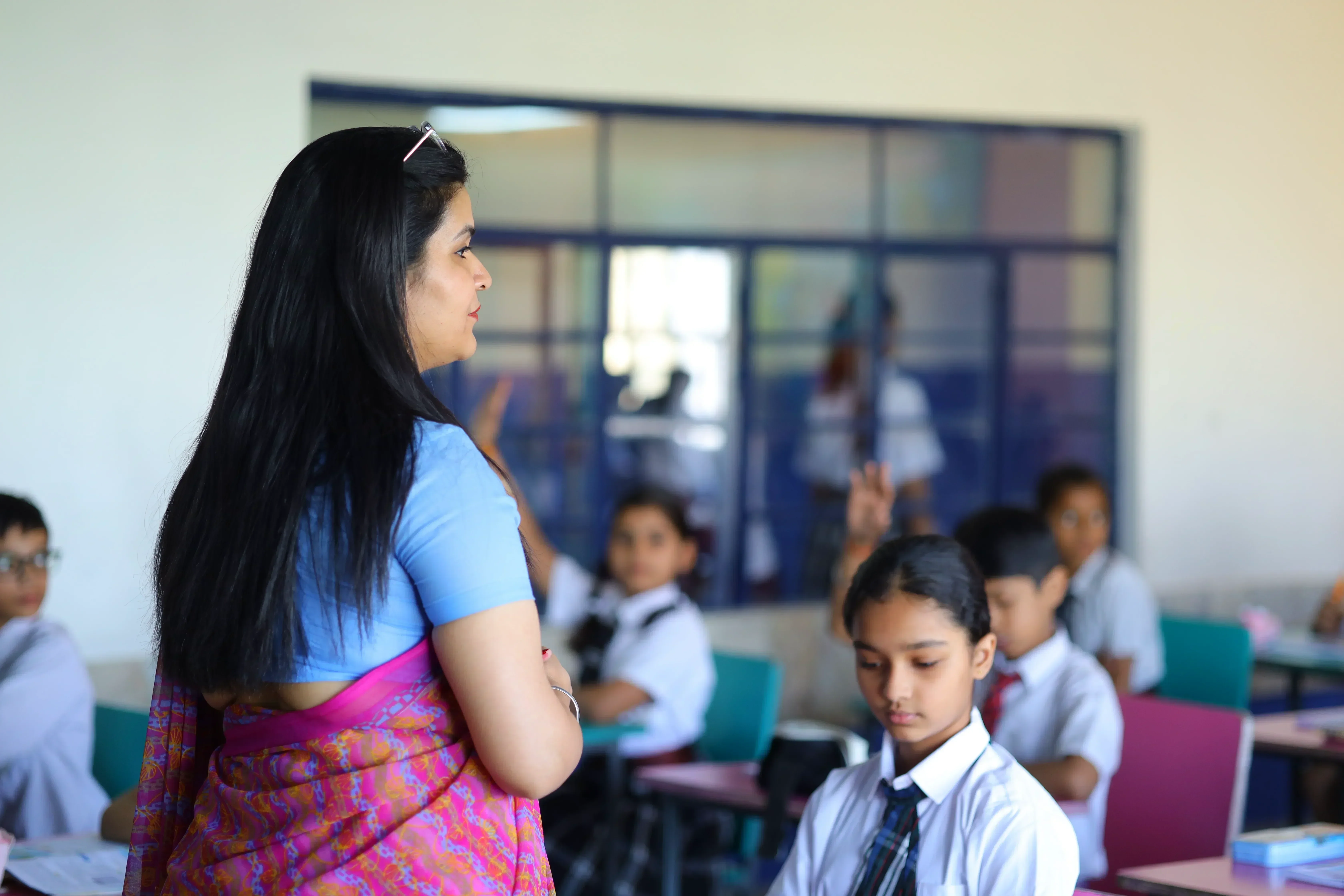 Teacher with students in classroom