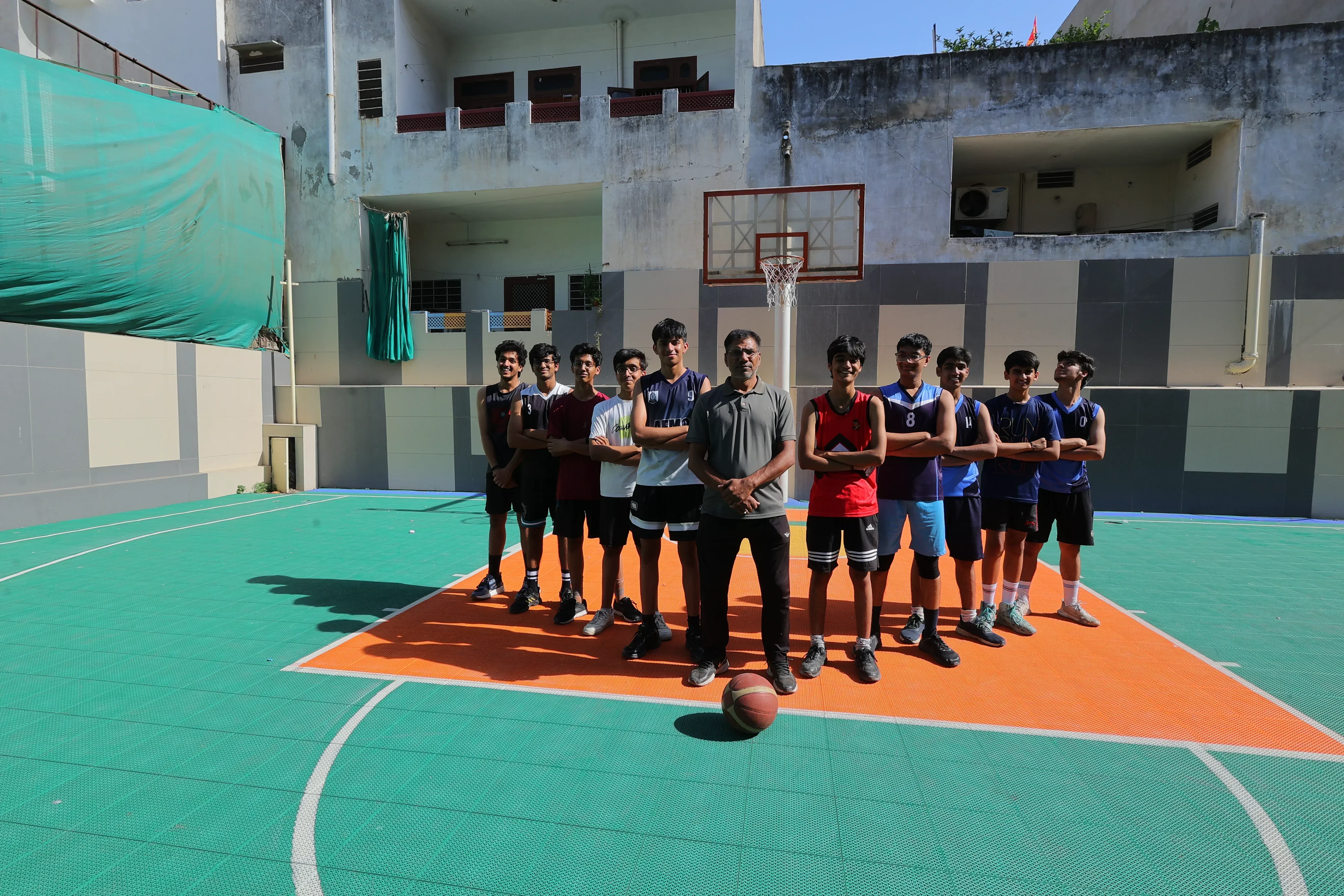 Basketball team on court